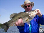 Louis with an 8-6, his biggest bass ever, caught while fishing with 