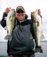 Tom with a good Double with the biggest over 8lbs with Pro Guide Jimmy Everett