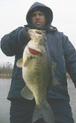 Craig with a fat 7 lb 15 oz bass caught on a lipless crank fishing with Pro Guide Tom Redington
