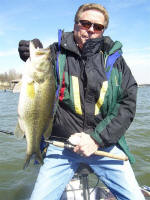 James Brown with a good one caught with guide John Tanner on a lipless crankbait 
