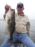 W H with Martin Gas Co. with a 7 3/4 pound hog caught on 5/4