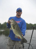 Chris Sinkey with a 24 1/2 in. weighing 9.75 lbs.  Caught on 5/5/09 in 3 ft. of water.