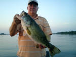 Marshall Johnson with a 8.4 lb bass caught on 6/25/09