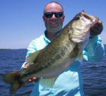 Pro Guide Tom Redington with a nice deep water bass.