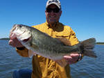 Gilbert with a bass caught while fishing with Pro Guide Eddie Garrett 