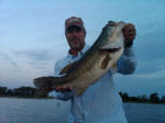 Pro Guide John Tanner with a summer time hog