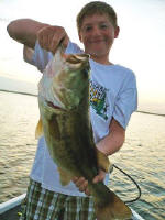 Keegan Finley from Michigan. Caught this bass August 9, 2011, while fishing  Pro Guide Gary Johnson