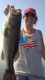 Dorinda Crisp with a nice Lake Fork bass caught 6/24 while fishing with John Tanner