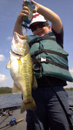 6 year old Austin Tanner with a nice bass caught while fishing with his Dad, Pro Guide John Tanner