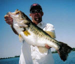 Gary Wilson with a deep water 9lb plus bass caught with Pro Guide Jimmy Everett