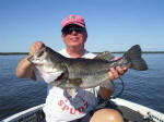 Ron from Ohio with a Lake Fork bass caught while fishing with Pro Guide John tanner