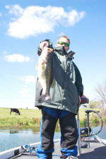 13 year old Andrew Giles from Mississippi with a 7lb bass he caught fishing with Pro Guide Tom Redington. 