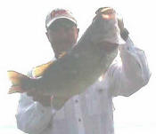 Pro Guide John Tanner with a Lake Fork bass that weighed 8 1/4 pounds. 