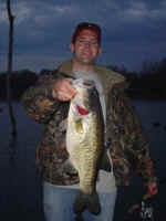 Charlie Emeterio displays a super Lake Fork bass one of many caught the weekend of March 11, 2004. 