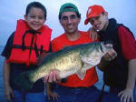 Stephen Gould with a 10.1 lb Lake Fork Trophy caught 8/9/05 while fishing  with sons Colin and Brendon,  Guide JW Peterson.