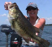 Elaine Shultz with a 7.9 bass caught while fishing with Pro Guide John Tanner.