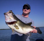 Jeff Delaughter from Tulsa OK. with a bass weighing 9 1/2 pounds caught fishing with  Pro Guide John Tanner.