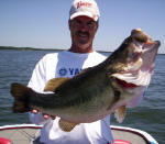  Pro Guide John Tanner with a bass weighing 11.2. It was an awesome day with several other fish in the 4 to 7 1/2 pound range as well. Most of these fish came on a Mutant by www.grandebass.com