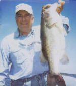 Steve Maus with a 9 lb. Lake Fork trophy caught while fishing with Lake Fork Pro Guide John Tanner
