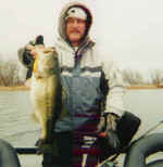 Larry Merseal was glad that he & his buddies chipped the ice off the boat ramp to put in on a cold Feb. 2003 day.