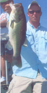 Guide Jimmy Everetts with a nice Lake Fork bass.  Picture courtesy of  Axton’s Bass City. 