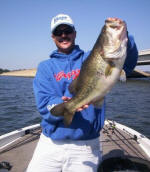 Pro Guide  John Tanner with a nice bass weighing 8.3 caught 9-13-06.