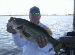 Robert Garlock from Shreveport LA with a bass weighing 7.5. This was 2 of many fish caught. Robert fished with  Pro Guide   John Tanner for the last three days. He had an awesome trip as they boated over 70 bass total for the three day trip.