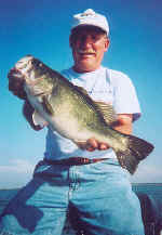 Willard Harper from Dallas, TX with a nice Lake Fork bass caught 6-30-03