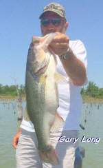 Lake Fork Guide Gary Long with a 9.6lb, bass.