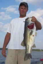 Dave Redington with a 7.5 lb'er caught on Carolina rigged Lake Fork Baby Creature, while fishing with Pro Guide Tom Redington