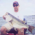 Russ Rowe from Ardmore, Oklahoma caught this trophy bass weighing 13.76. Russ was presented a $1000.00 check from Axton's Bass City for catching this bass while staying at Axton's