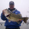 Pro Guide John Tanner  with a nice bass he caught 2/22 on a red lipless crankbait.