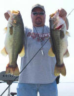 Brian Troutman, holding a couple of big bass that were caught on Lake Fork Baby Creatures on 7/14. Brian was fishing with Pro Guide Tom Redington.