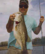 Drew Wolford displays a Lake Fork trophy he caught while fishing with Lake Fork Pro  Guide Tony Clark.