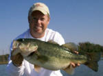 Pro Guide Tom Redington with a nice fall bass