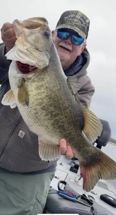 Lake Fork Guide Tom Evans with a 11.14 bass 