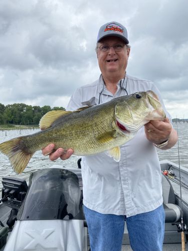 Randy with a big one caught while fishing with Guide Tom Evans