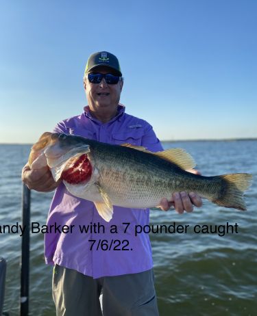 Mr. Barker with a 7lb bass caught whlle fishing with Lake Fork Guide Tom Evans
