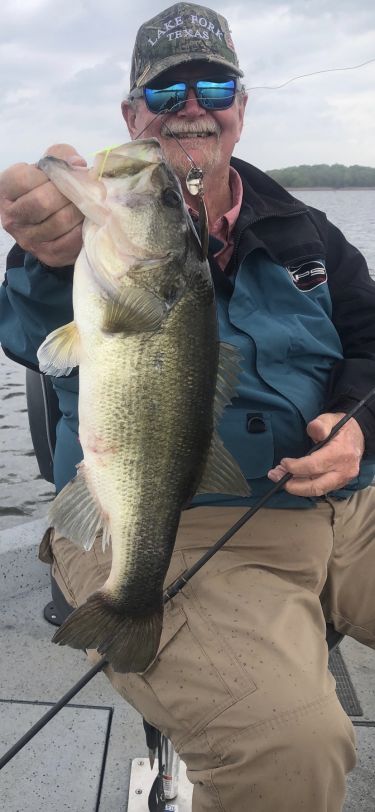 Lake Fork Guide Tom Evans with a bass caught while fishing Lake Fork